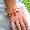 CHARM IT! Hello Kitty Charm Bracelet with Hello Kitty Bow and Charms - charmit.com 