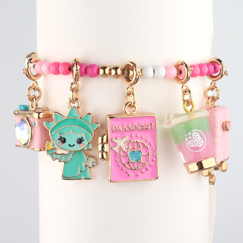CHARM IT! Passport  Charm, Statue of Liberty Charm,  Suitcase Charm, Camera Charm, and Strawberry Charm - charmit.com